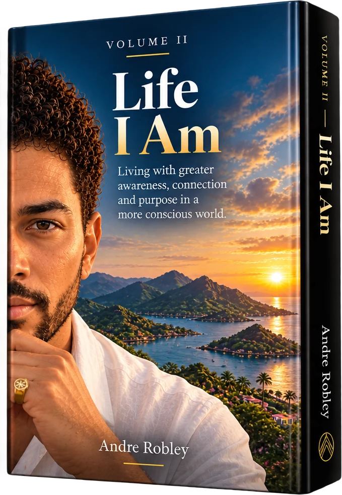 Cover of Life I Am, Volume II, by Andre Robley: the author in a white shirt against islands and a sunset sea.